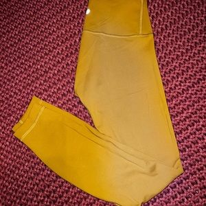 Lululemon wunder train 28” gold leggings, size 4